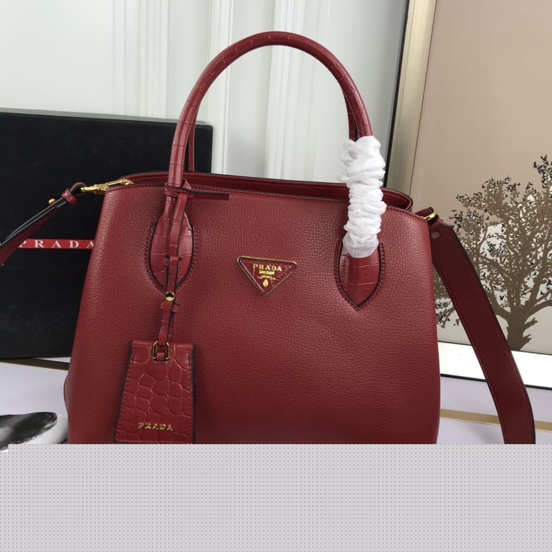 Pra*a top handle bags